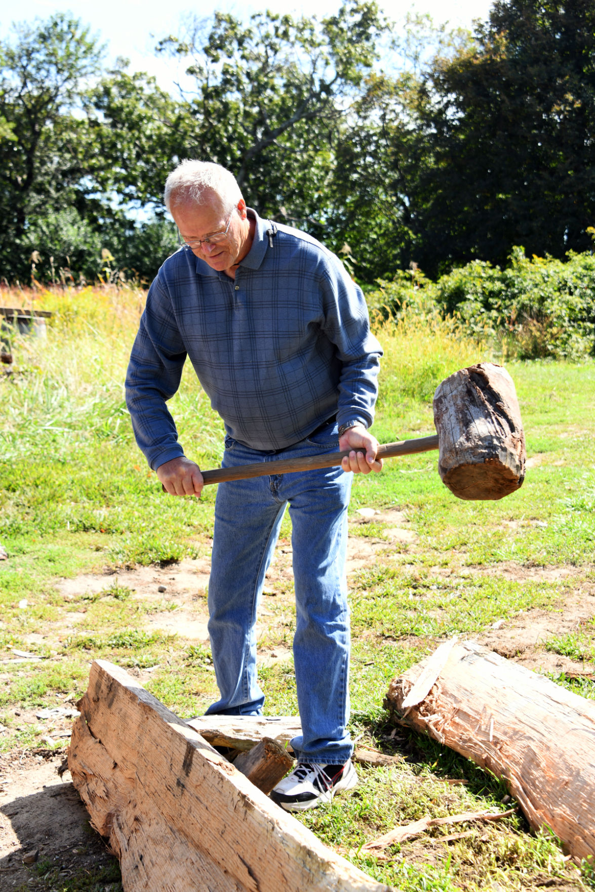040 Gerald Kealiher splits a log to make clapboard for siding..jpg